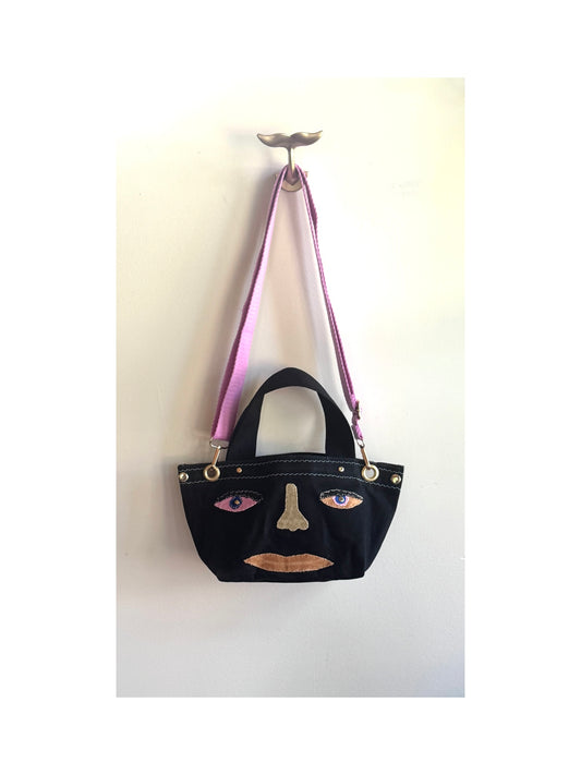 Surrealist Face Bag on Waxed Cotton