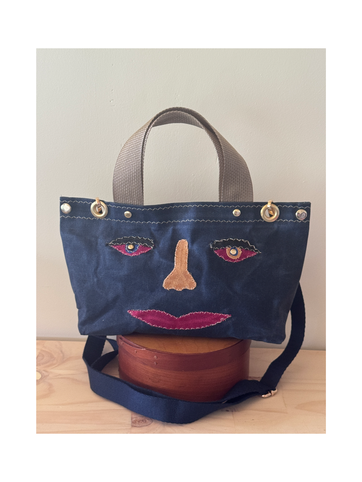 Surrealist Face Bag on Waxed Cotton