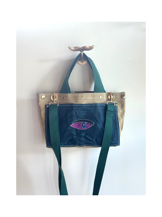 Surrealist Face Bag on Waxed Cotton
