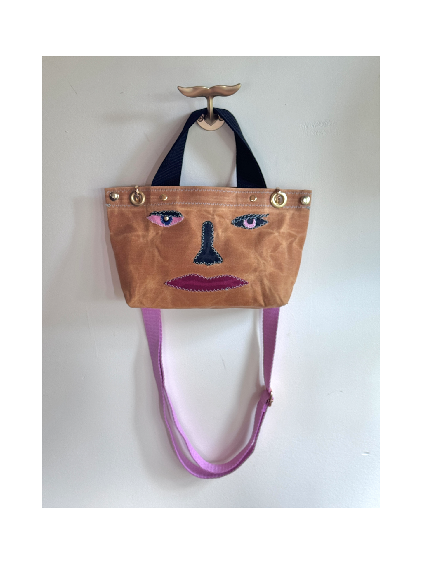Surrealist Face Bag on Waxed Cotton