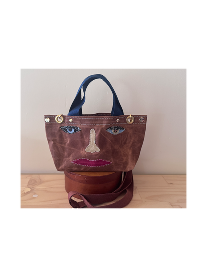 Surrealist Face Bag on Waxed Cotton