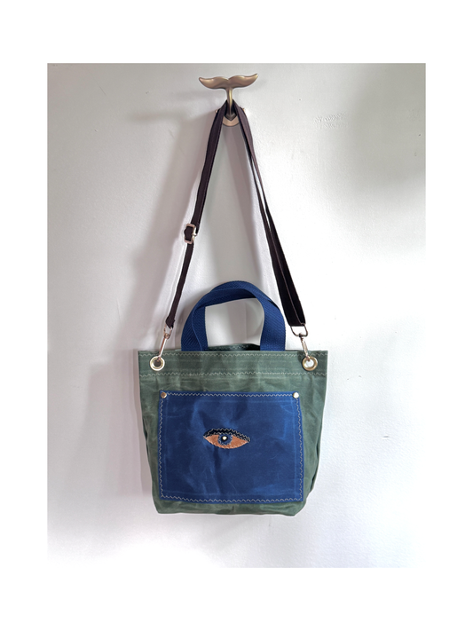 Surrealist Face Bag on Waxed Cotton