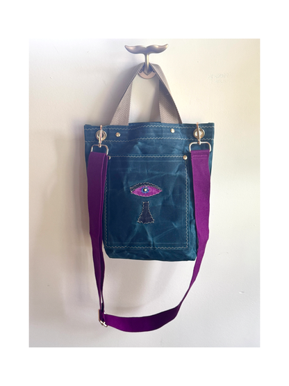 Surrealist Face Bag on Waxed Cotton