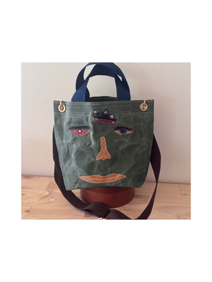 Surrealist Face Bag on Waxed Cotton