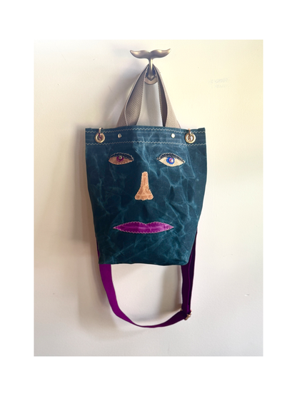 Surrealist Face Bag on Waxed Cotton