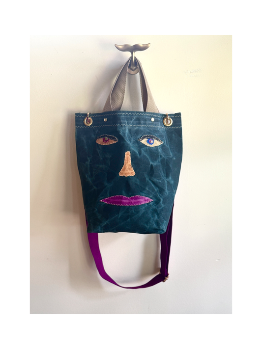 Surrealist Face Bag on Waxed Cotton