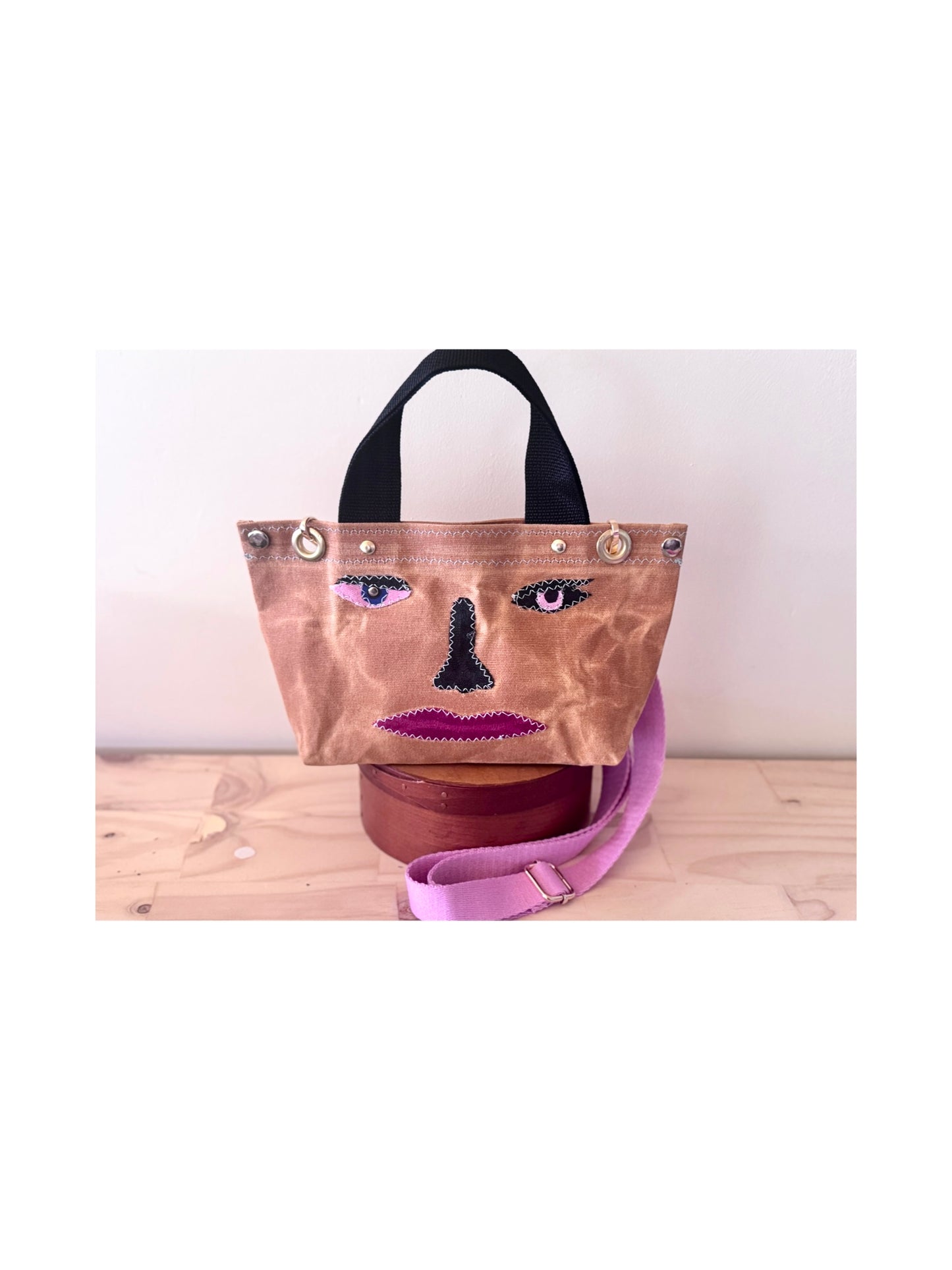Surrealist Face Bag on Waxed Cotton
