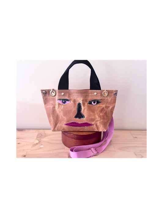 Surrealist Face Bag on Waxed Cotton