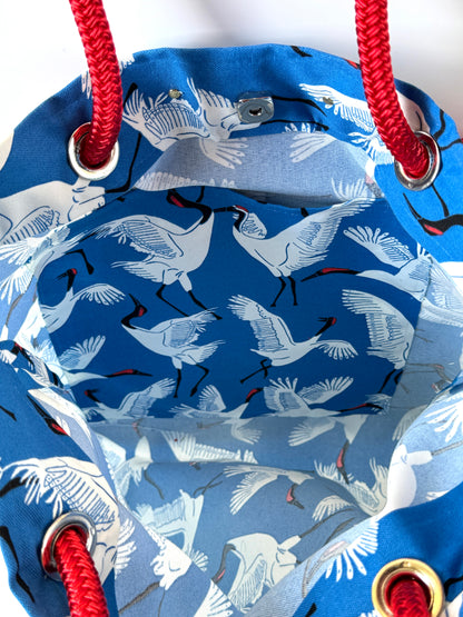 The Tall Buoy Bag in  Dancing Cranes (Blue)