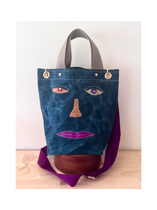 Surrealist Face Bag on Waxed Cotton