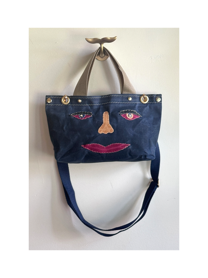 Surrealist Face Bag on Waxed Cotton
