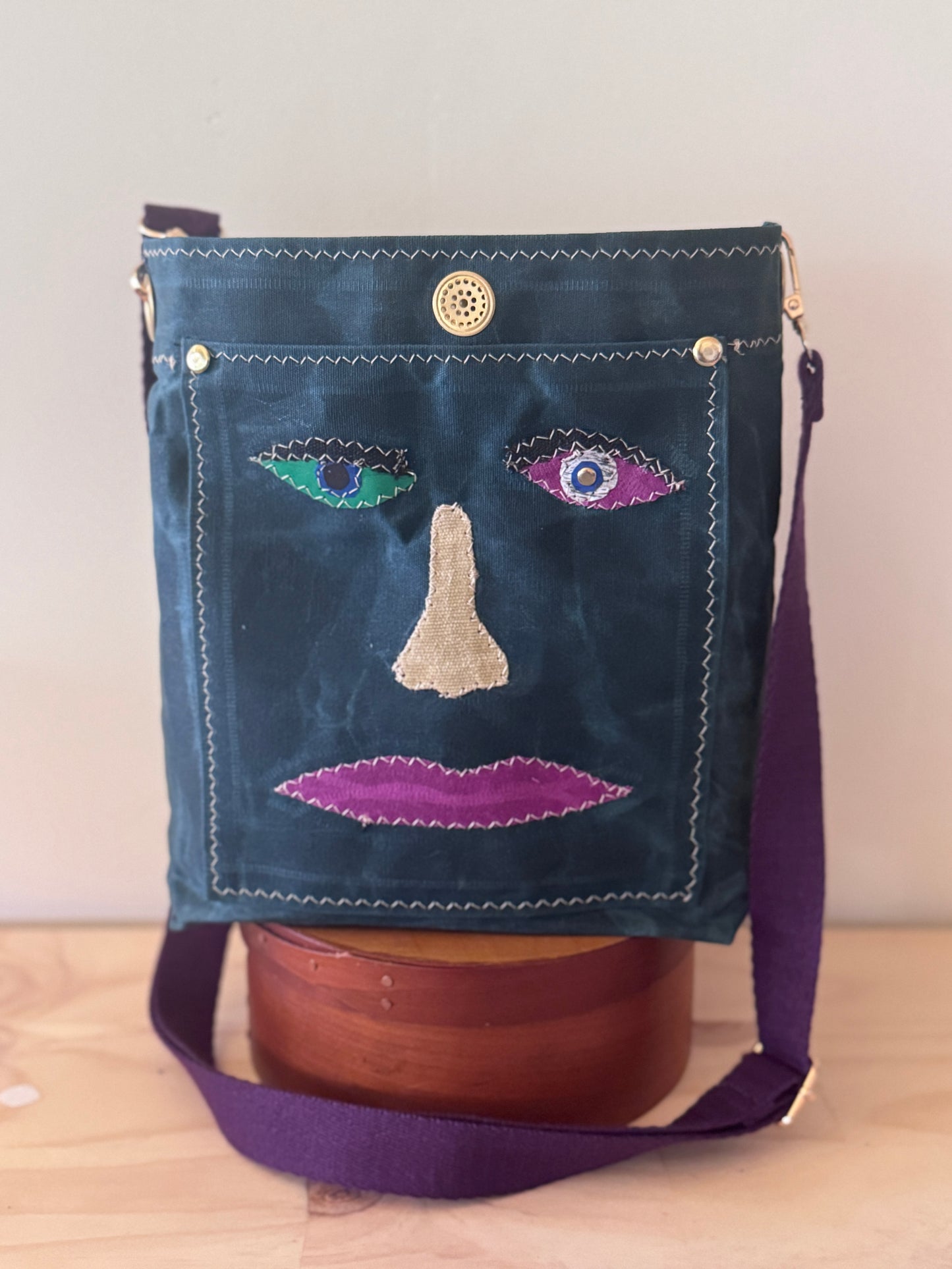 Surrealist Face Bag on Waxed Cotton