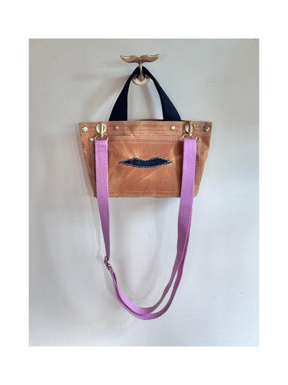 Surrealist Face Bag on Waxed Cotton