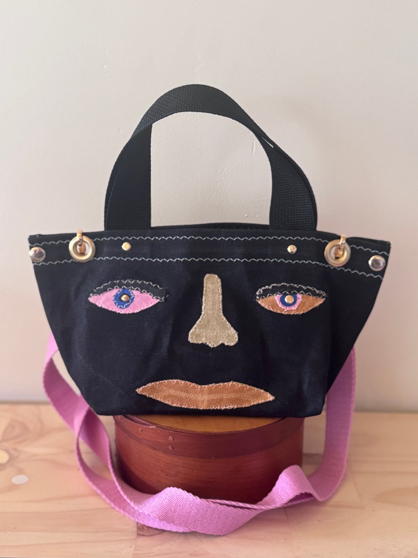 Surrealist Face Bag on Waxed Cotton
