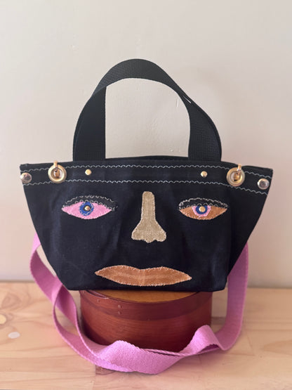 Surrealist Face Bag on Waxed Cotton