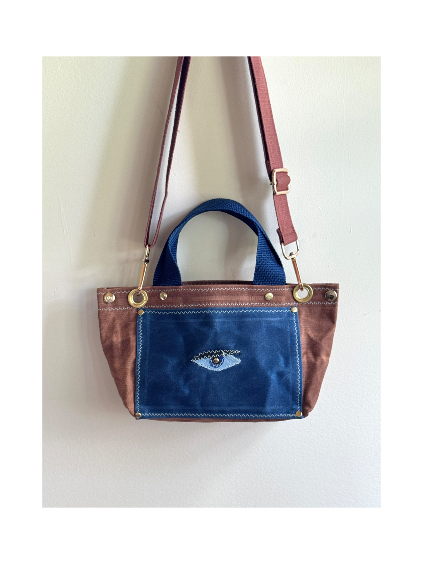 Surrealist Face Bag on Waxed Cotton