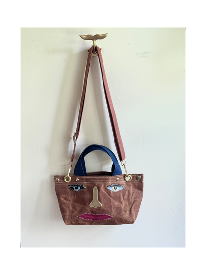Surrealist Face Bag on Waxed Cotton
